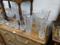 A quantity of cut glass vases and similar, mostly Bohemian