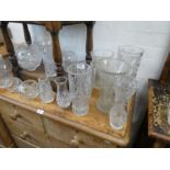 A quantity of cut glass vases and similar, mostly Bohemian