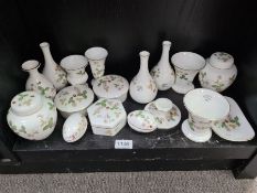 A quantity of Wedgwood Wild Strawberry pattern vases, trinket boxes and similar
