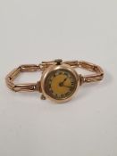 Antique 9ct yellow gold watch with textured dial Roman numerals, on adjustable strap marked 375, app