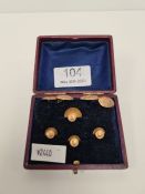 Cased set of 4 9ct gold dress studs marked 375, Birmingham and a pair of oval floral engraved matchi