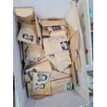 A small box of vintage film negatives and slides relating to famous actors and actresses, to include