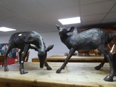 A pair of modern bronze sculptures of young Deer, 48.5cm