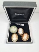 Two 9ct gold mounted cameos, plated example and silver Wedgwood brooch