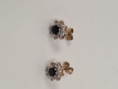 Pair of sapphire and clear stone cluster earrings, marked 375, approx 1.4g