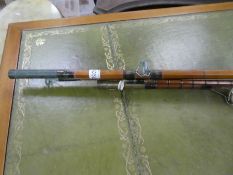 A News of The World prize big game fishing rod, 7ft and one other split can 8ft rod, both circa 1950