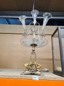 A silver plated Epergne having 4 glass trumpets, the base decorated 3 gilt metal birds