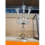 A silver plated Epergne having 4 glass trumpets, the base decorated 3 gilt metal birds