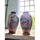A pair of 20th Century Japanese Satsuma vases decorated figures