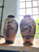 A pair of 20th Century Japanese Satsuma vases decorated figures