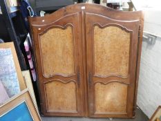 A pair of antique French wardrobe doors with surround and Cornice having Burr Walnut panels