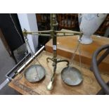 A set of Victorian brass weighing scales, a coal scuttle and a box of pictures