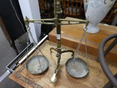 A set of Victorian brass weighing scales, a coal scuttle and a box of pictures