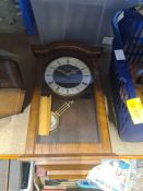 Two mantle clocks and a wall clock