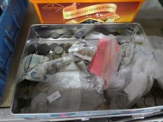 A quantity of GB and Worldwide coins and an album, including vintage postcards.