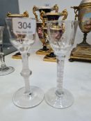 A Georgian single knop air twist wine glass, 15cm high approx, 5.2cm diameter approx. Plus, an air t