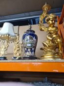 A large gilt cherub lamp and 3 other table lamps