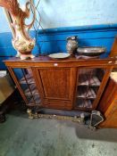 An Edwardian inlaid mahogany display cabinet having central cupboard and drawers