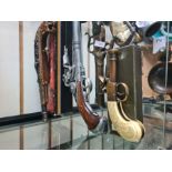A selection of reproduction firearms, mostly Flintlock pistols