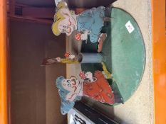 A vintage circular stand decorated 3 Snow White figures, holding mushrooms, a Triang Minic Motorway