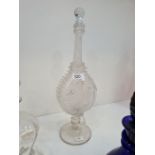 A Victorian Continental glass decanter having swirl decoration on circular footed base, 41.5cm
