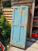 An old painted pine 2 door cupboard probably early 20th Century