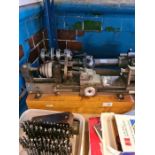 A 1920s Wade lathe and accessories, one other lathe and other related items