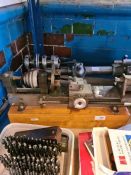 A 1920s Wade lathe and accessories, one other lathe and other related items