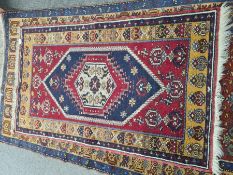 Two Turkish hand woven geometric style rugs 193 x 105cm