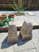 A pair of reconstituted staddle stones bases of square tapering form