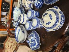 A quantity of blue and white china including 3 Spode cannisters