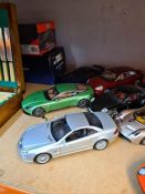 A quantity of 1:18 scale model cars including a Kyosho Lamborghini Miura (11)