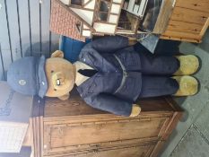 A large Merrythought 6 - 7ft approx Teddy Bear in blue Policeman's uniform