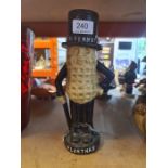 A reproduction cast iron Mr Peanut moneybox