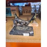 A reproduction bronze sculpture of dog and rat, the base stamped Barye, and a pair of French German