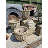 A set of 3 reconstituted garden pots on square bases, two ieth plinths