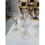Two 18th Century single knop and drinking glasses having domed foot and trumped shaped bowls, 13cm a