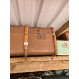 An old canvas trunk and other cases