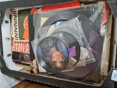 A small quantity of vinyl records including picture discs by Roxy Music and other music related ephe