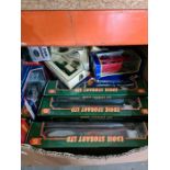 A box of die-cast lorries, mainly Eddie Stobart, small Lego sets and sundry