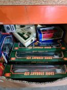 A box of die-cast lorries, mainly Eddie Stobart, small Lego sets and sundry