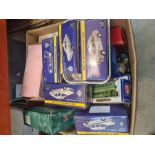 A carton of die-cast vehicles and others, mostly boxed