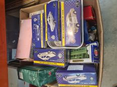 A carton of die-cast vehicles and others, mostly boxed