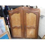 A pair of antique French wardrobe doors with surround and Cornice having Burr Walnut panels