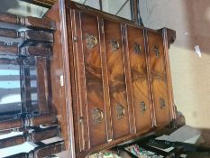 A reproduction chest having 4 drawe4rs with brushing slide