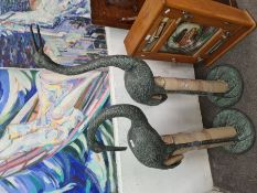 A pair of large Crane figures
