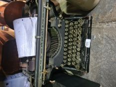 A vintage typewriter, a selectin of vintage brass including candle sticks, pots, etc, a salt-glaze b