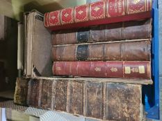 A large early 19th Century bible, other leather bound books and sundry books