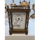 A French brass carriage clock, striking movement, four pillar decoration, 17cm