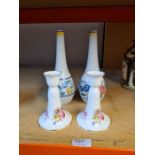 A pair of vintage Poole bottle vases and a pair of Worcester candle sticks